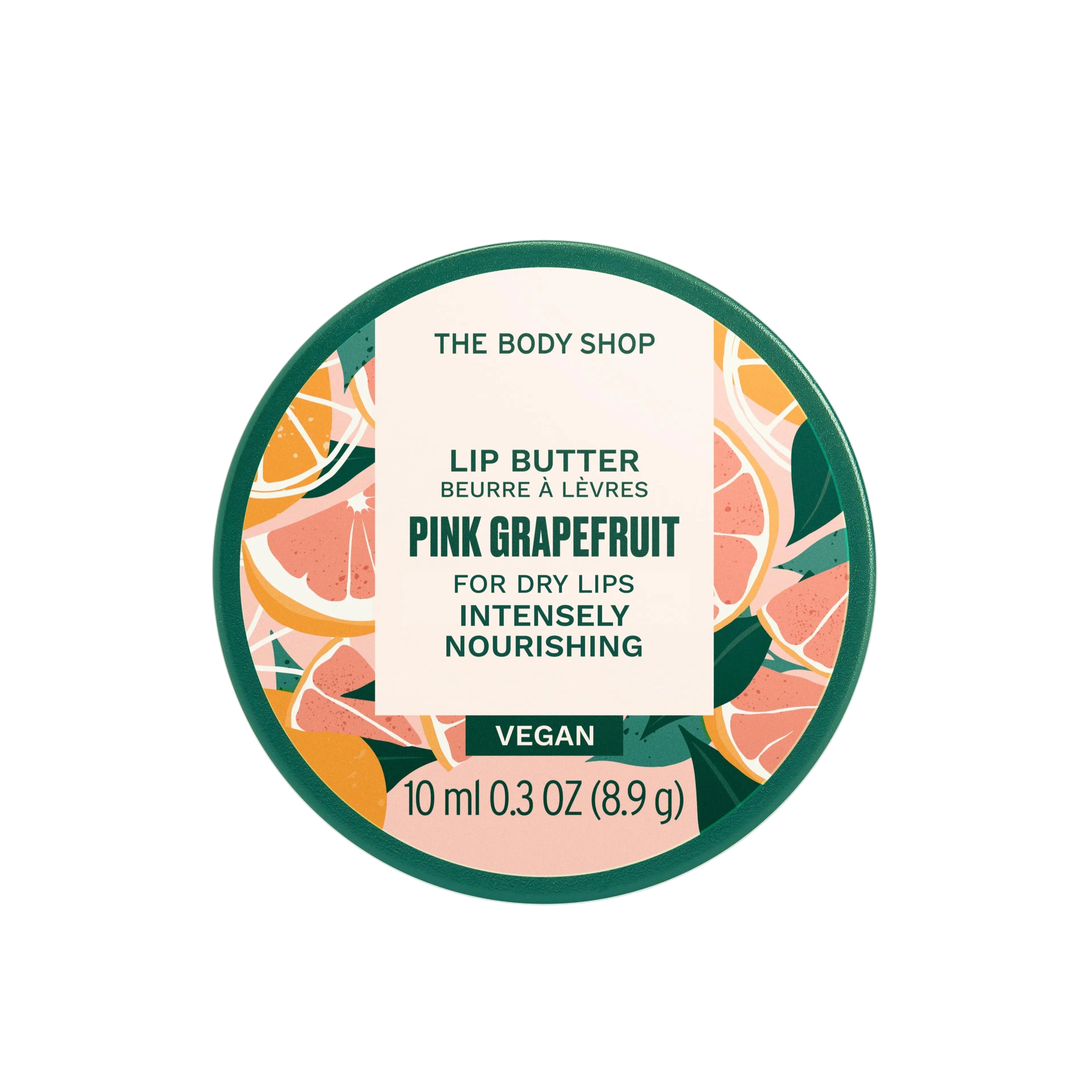 The Body Shop Pink Grapefruit lip butter container on a light beige background